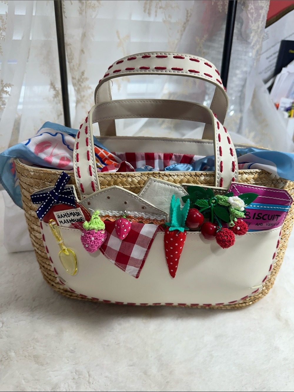 Braccialini picnic-style straw basket hand bag